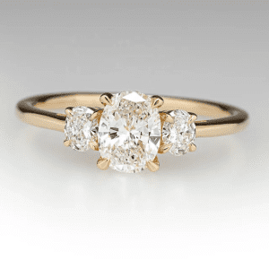 1.5 Carat Oval 3 stone 18K Yellow Gold VVS Moissanite stone