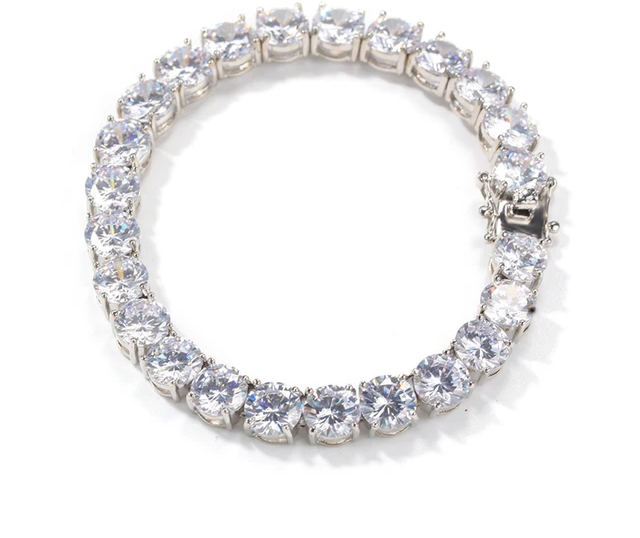 Iced Out Cubic Zirconia Tennis Bracelet. Brass Material.